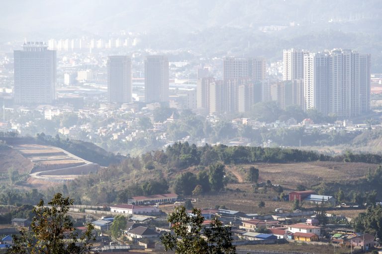 This photo taken on January 11, 2019 shows a general view of the town of Muse (foreground) and Ruili in China (background), as seen from Myanmar's border town of Muse in Shan state. (AFP)