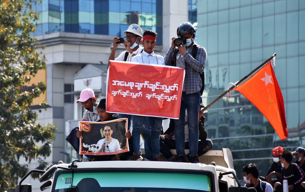 Photojournalists cover anti-coup protests in downtown Yangon on February 10. (Steve Tickner)