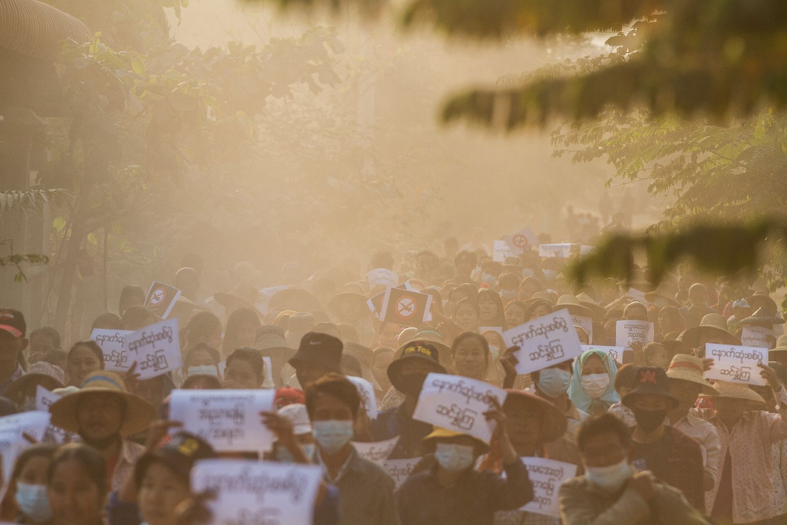 Protesters march during a demonstration against the coup in Sagaing Region’s Ayadaw Township on February 13, 2022. (AFP)