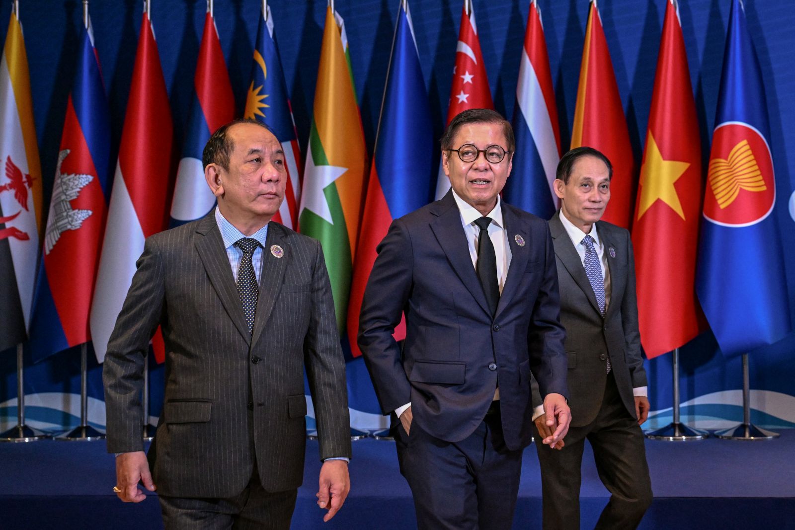 Permanent secretary of the regime’s Ministry of Foreign Affairs Hau Khan Sum, Thailand's foreign minister Sihasak Phuangketkeow and Vietnam’s foreign minister Le Hoai Trung walk together during the ASEAN Foreign Ministers' Retreat in the Philippine city of Cebu on January 29. (AFP)