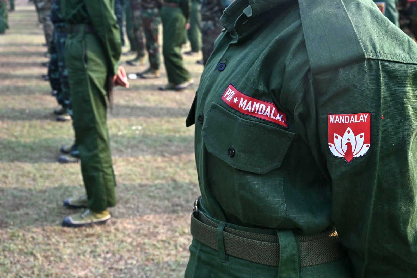Members of the Mandalay People's Defense Force attend a surrendering ceremony in Mandalay city on March 19. (AFP)