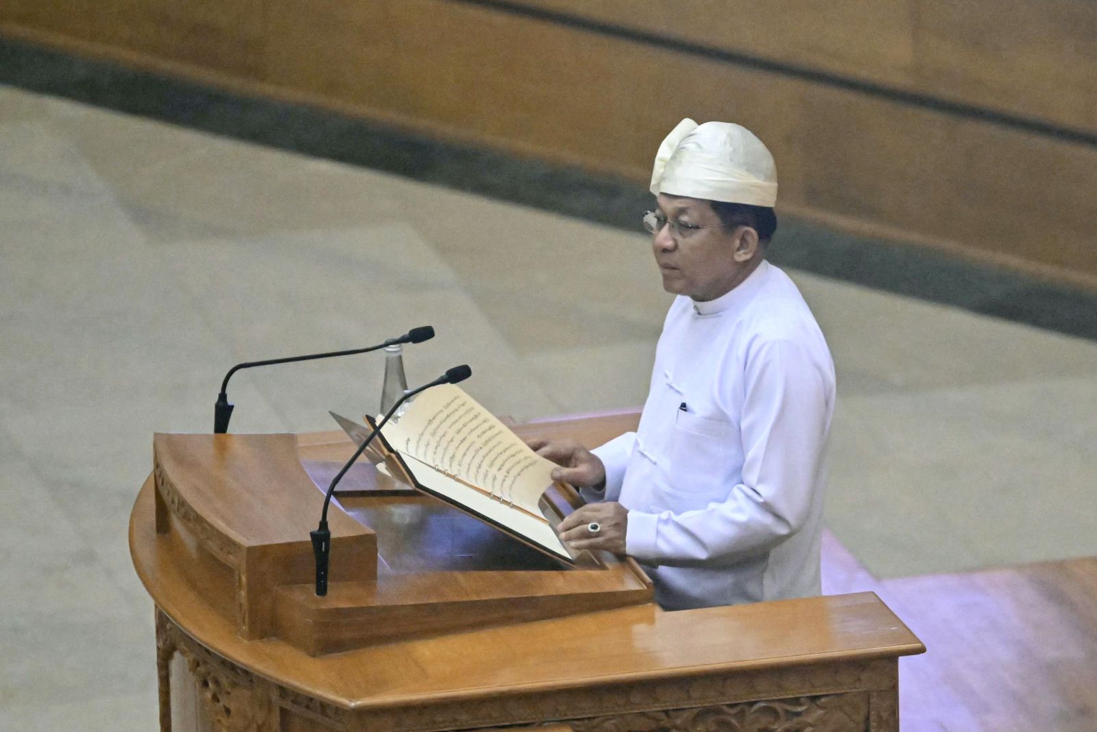 Min Aung Hlaing delivers a speech during his sworn-in ceremony as president at the Union Parliament in Nay Pyi Taw on April 10. (AFP)