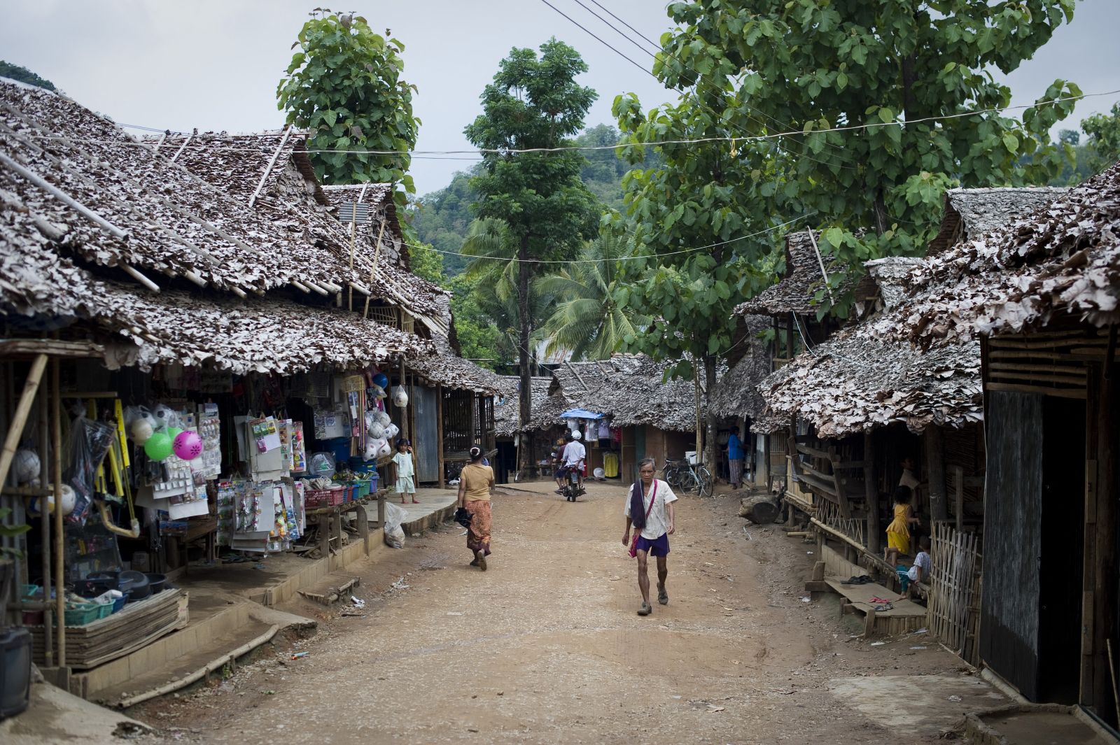 Myanmar refugees walk inside Mae La camp, in Thailand’s Tak province near the Myanmar border, on June 24, 2010. (AFP)