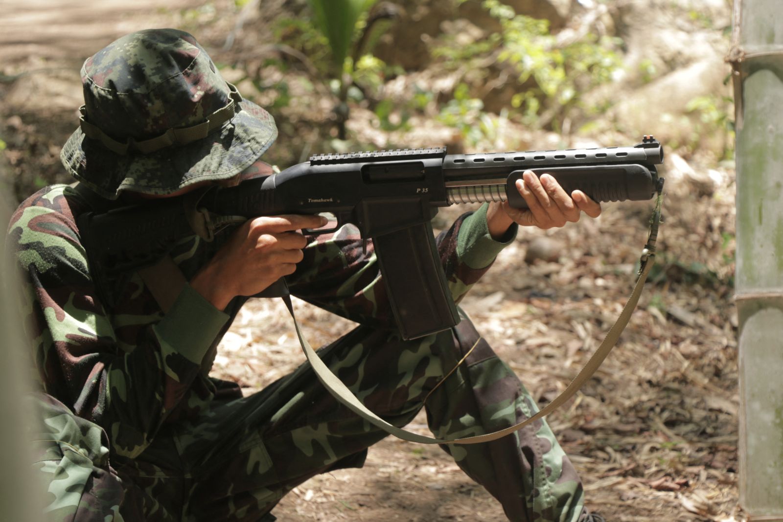 A pro-democracy activist undergoes military training at a Karen National Union camp in Kayin State in May 2021. (AFP)