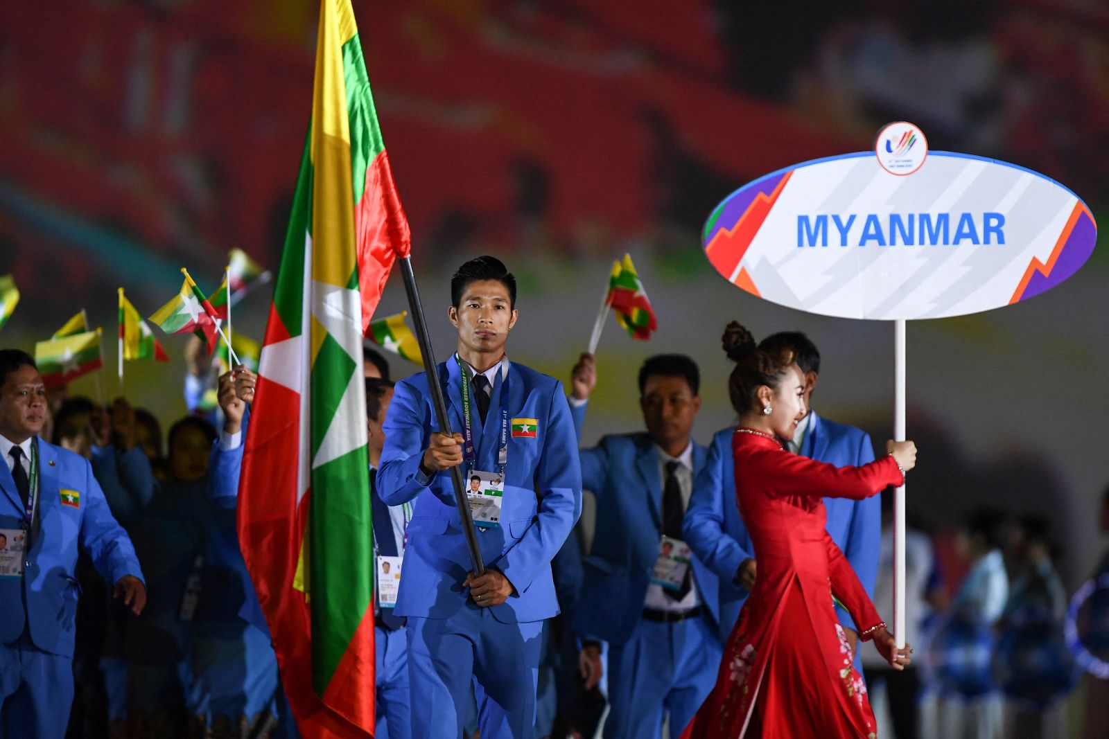 Members of the Myanmar delegation participate in the opening ceremony of the 31st Southeast Asian Games in Hanoi on May 12, 2022. (AFP)